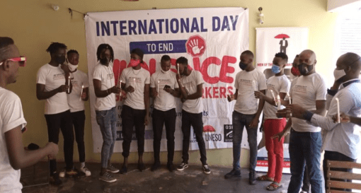 Members light candles in commemoration of our fallen comrades