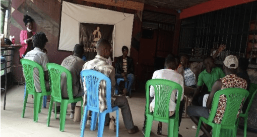 Members in session in progress conducted by a health worker