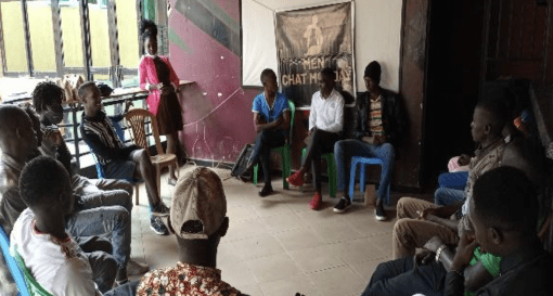 Members in session in progress conducted by a health worker
